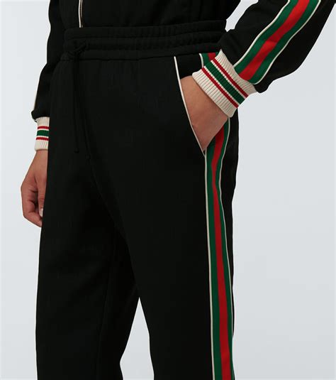 gucci holding|gucci sweatpants.